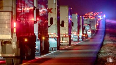 Line of trucks on the highway.