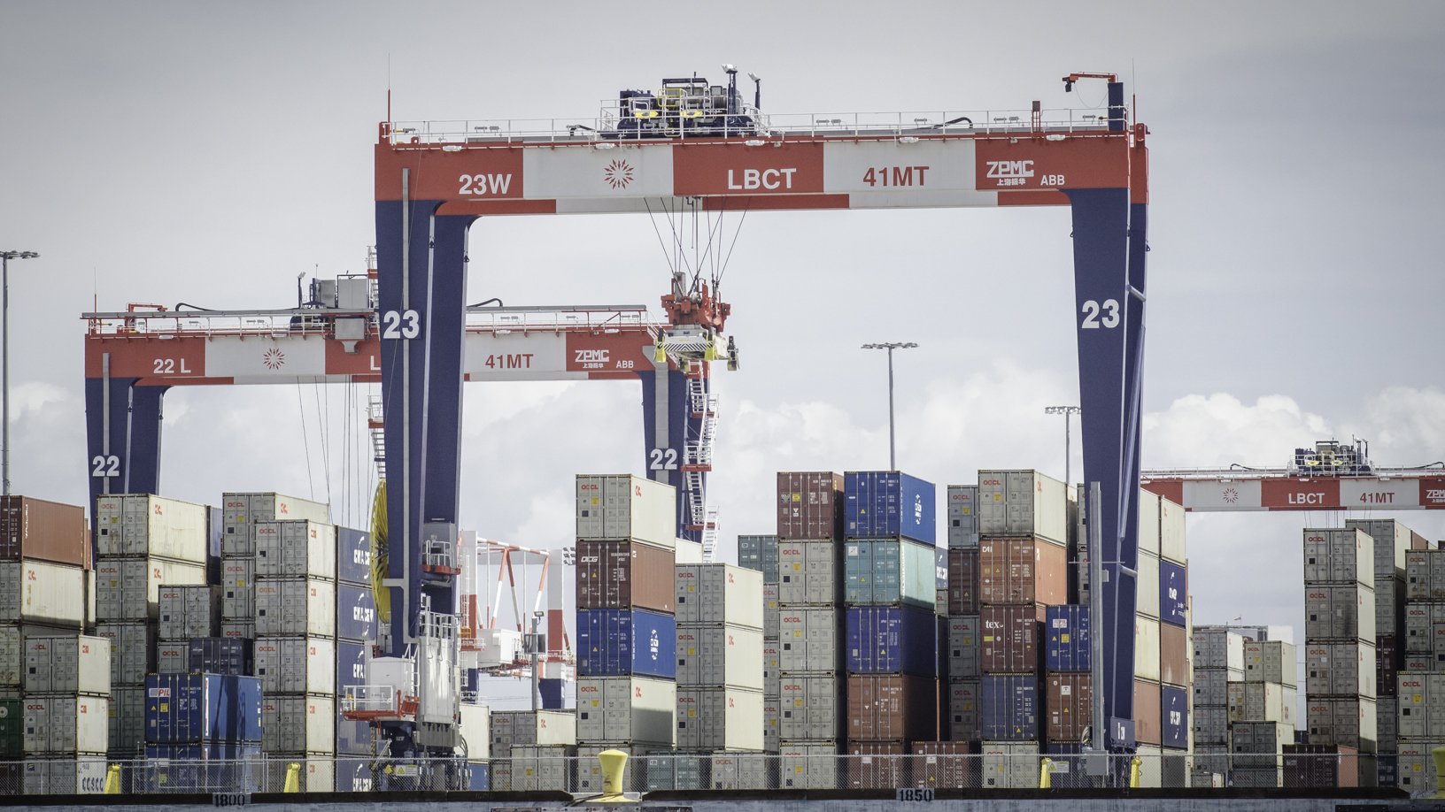 Cranes moving containers at Port of Long Beach