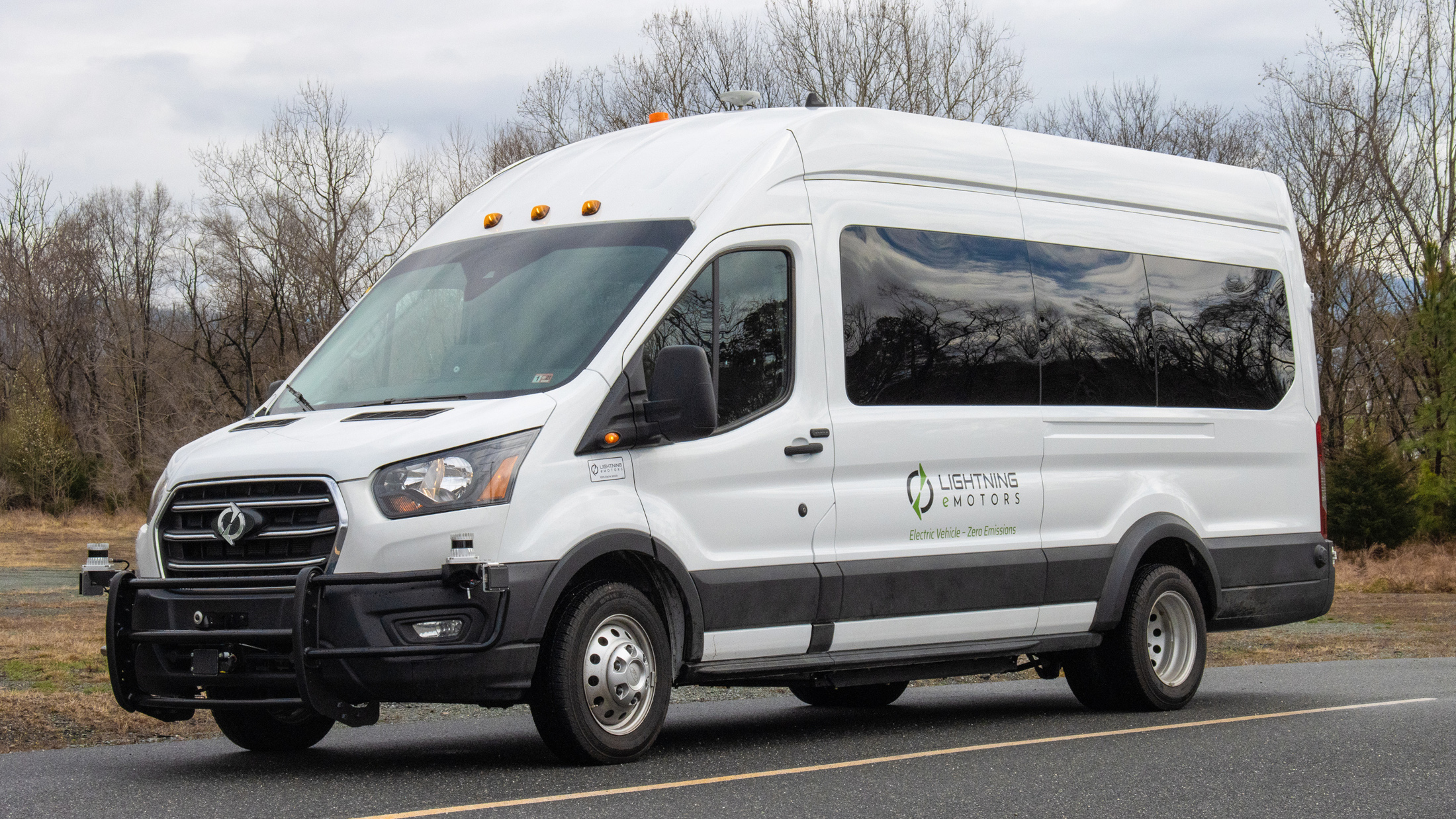 White passenger van