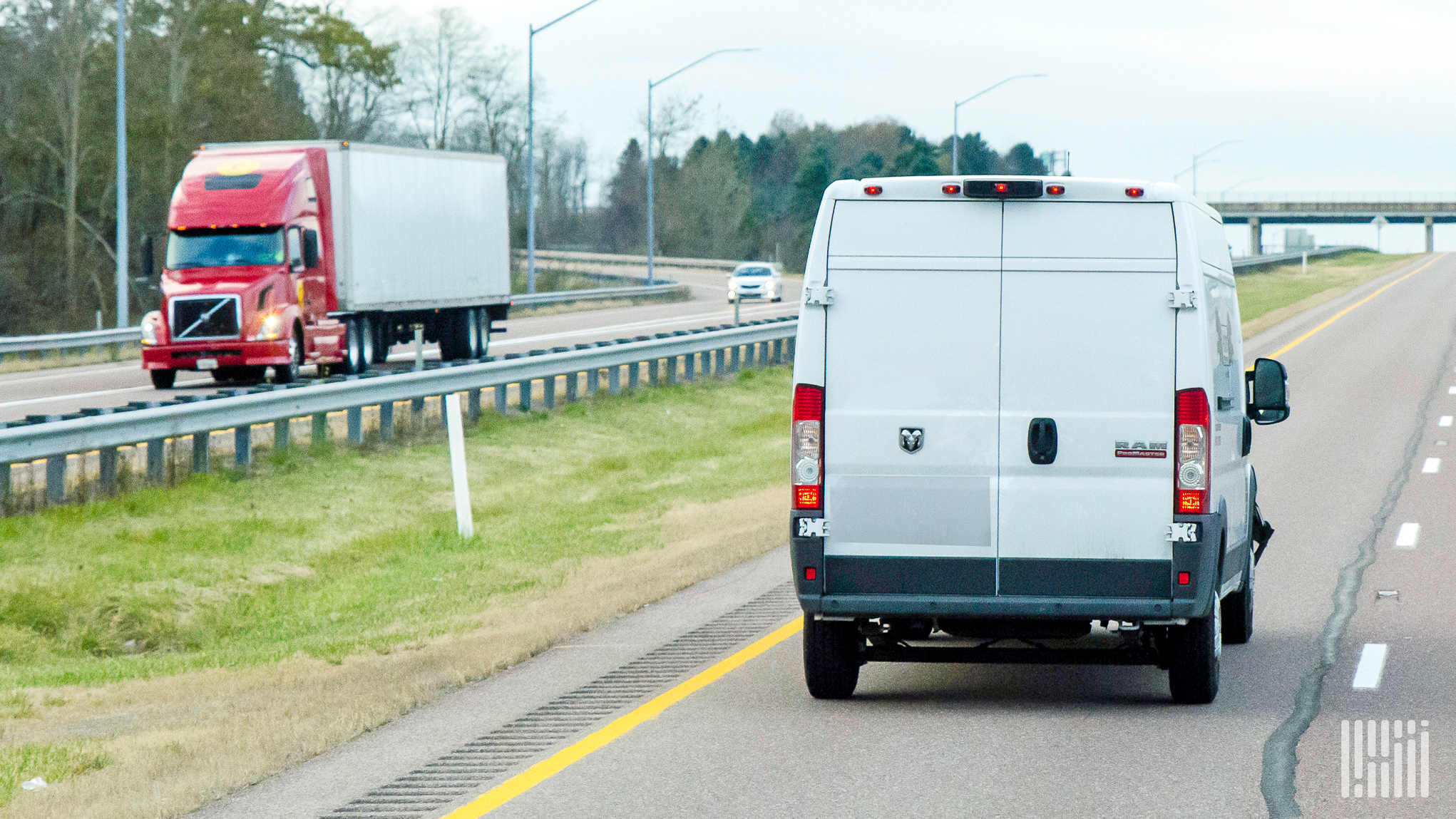 white delivery van on highway