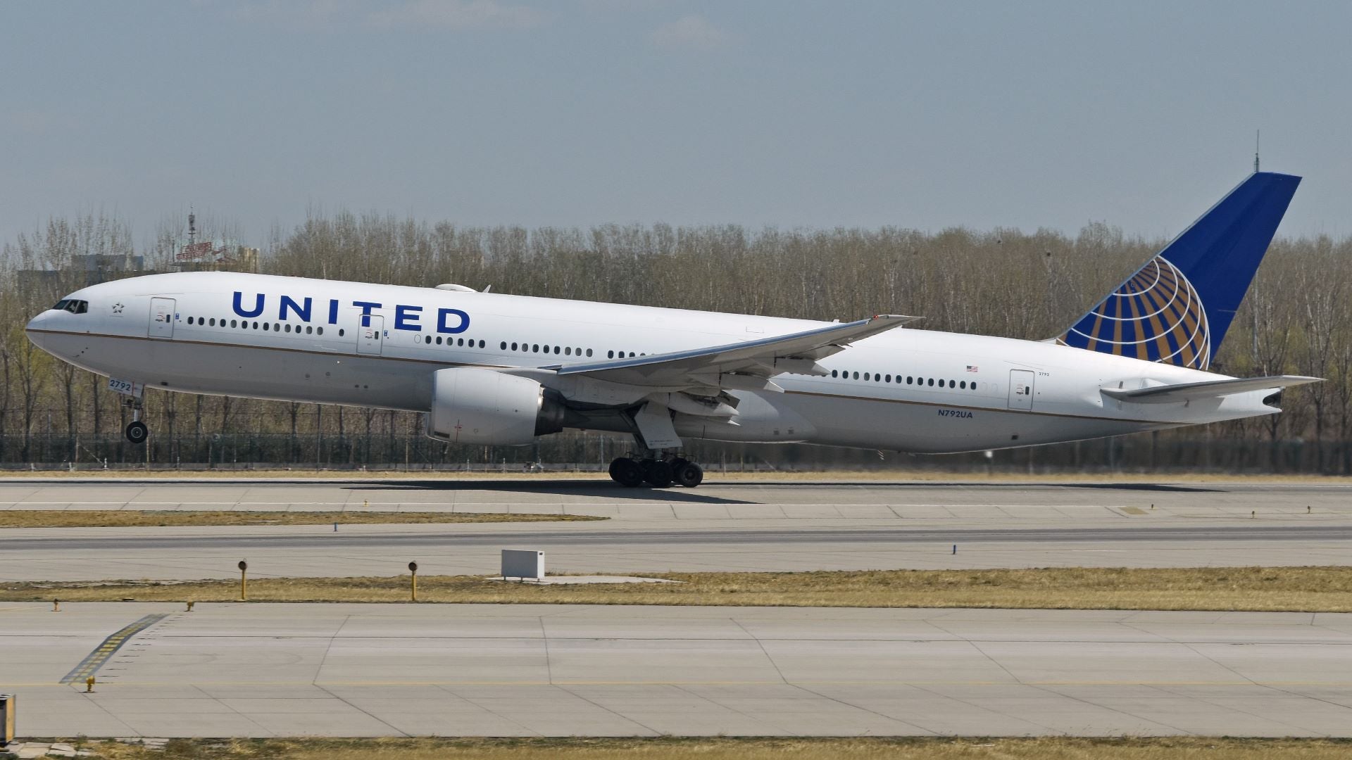 United Airlines Boeing 777-200 takes off from Beijing International Airport.