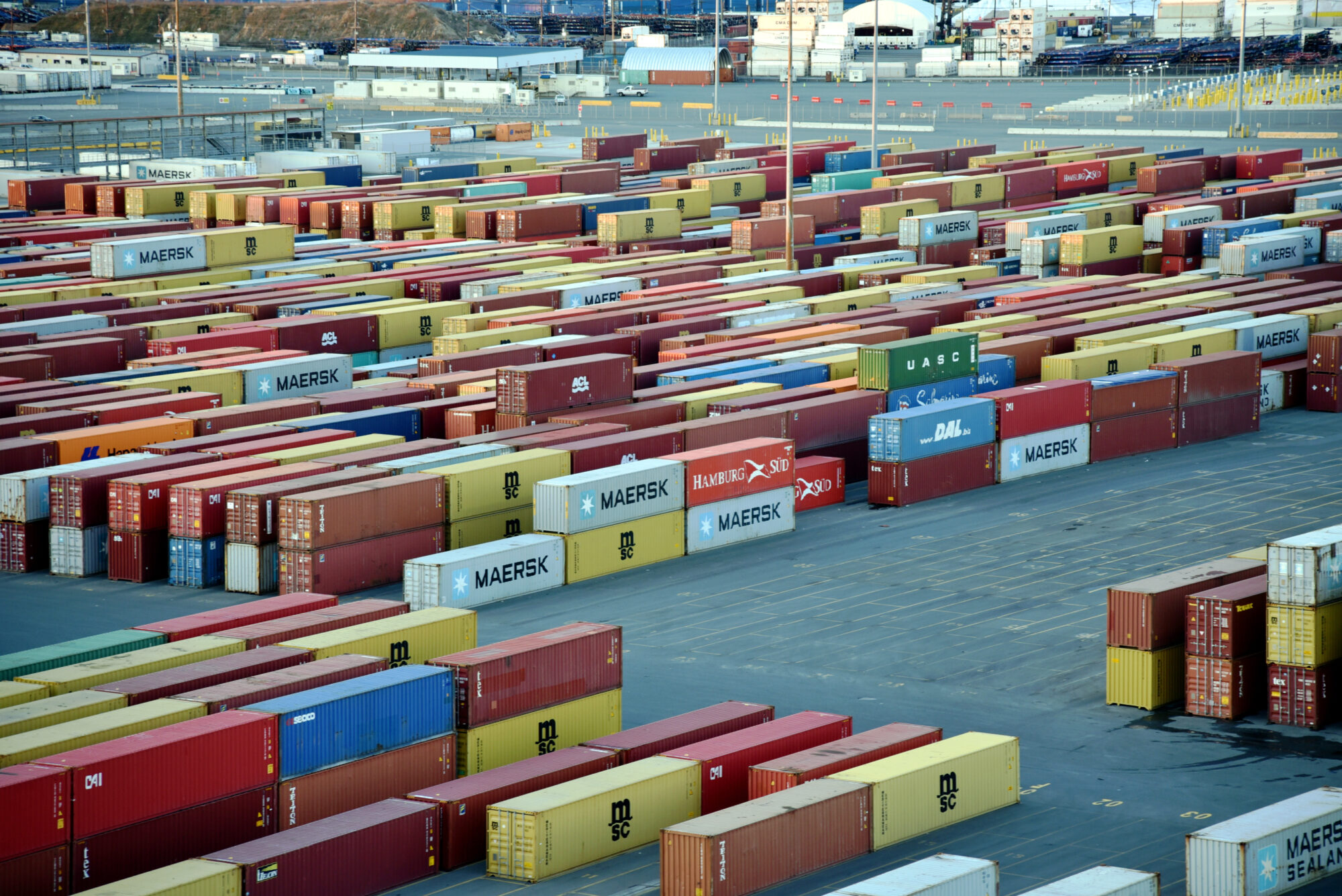 Shipping containers stacked at a port