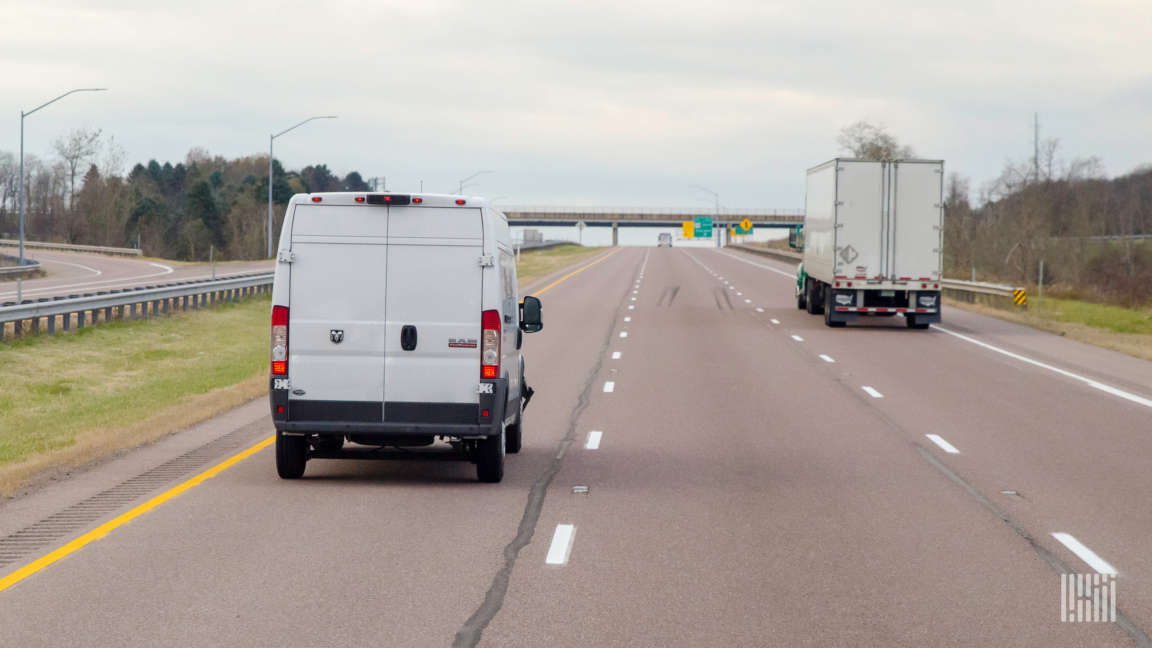 White delivery van on highway