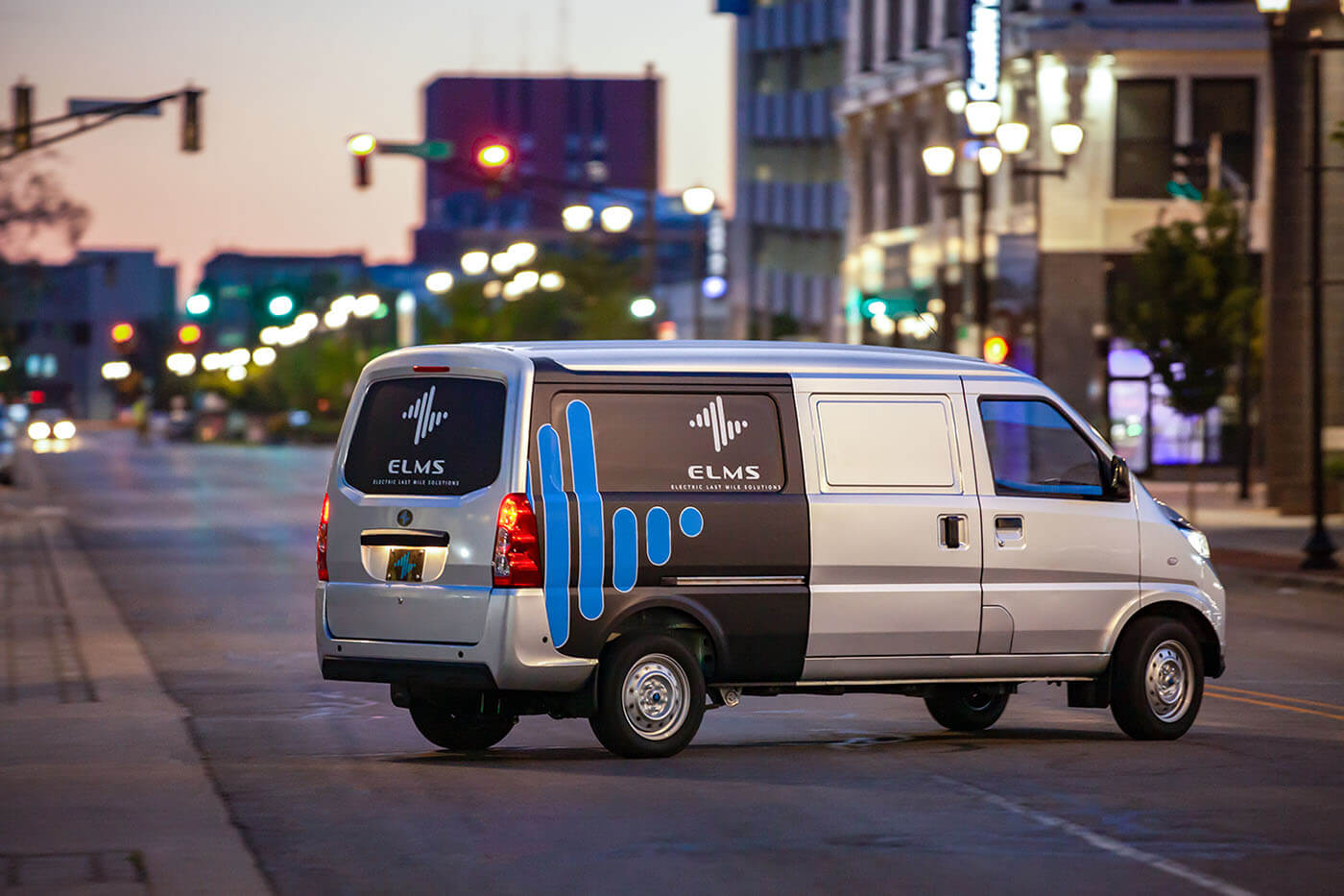 ELMS van in middle of street at dusk