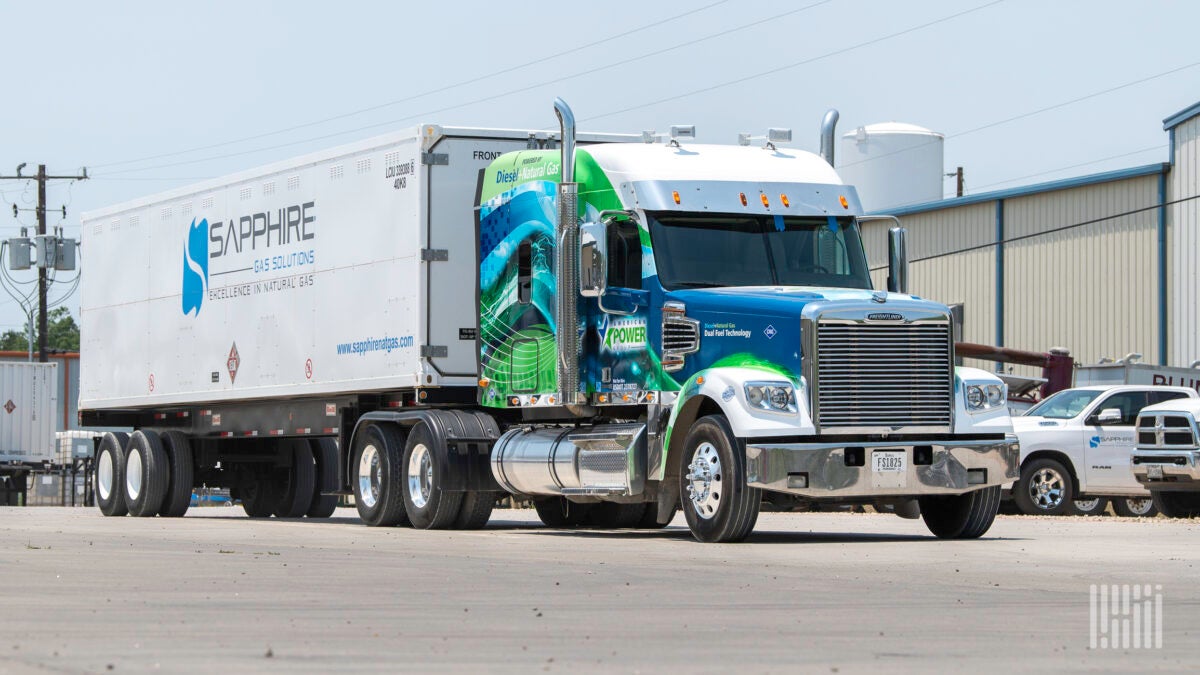 Multi-color graphics on a Freightliner Coronado equipped with dual fuel technology from the American Power Group.