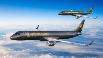 Computer generated image of two E-Jet cargo planes from Embraer painted in bronze and flying above the clouds.