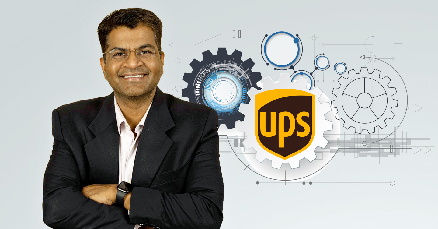 Bala Subramanian next to a UPS logo