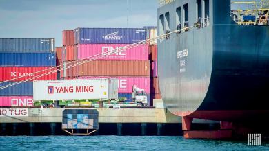 Shipping containers being unloaded from a ship at the Port of Long Beach.
