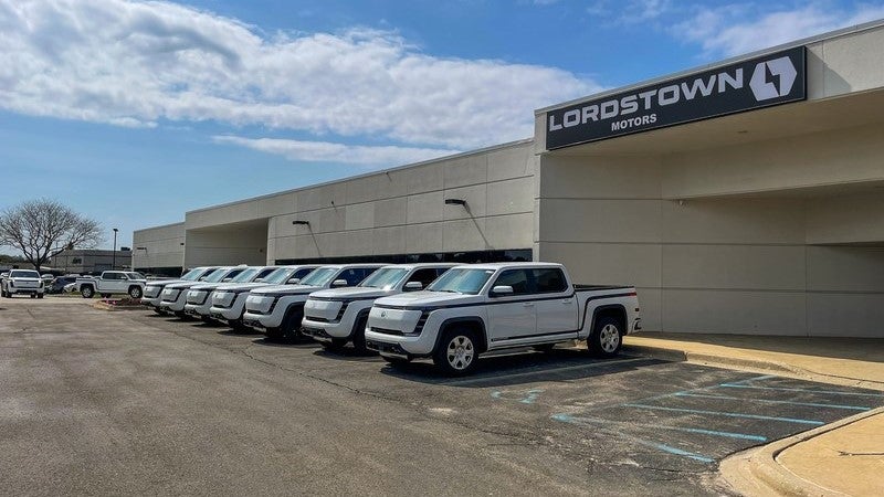 White Lordstown Endurance pickups outside testing facility in Michigan