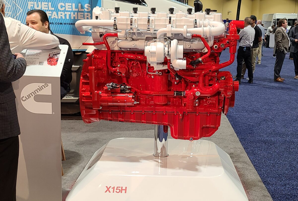 Red display model of a Cummins hydrogen-powered internal combustion engine