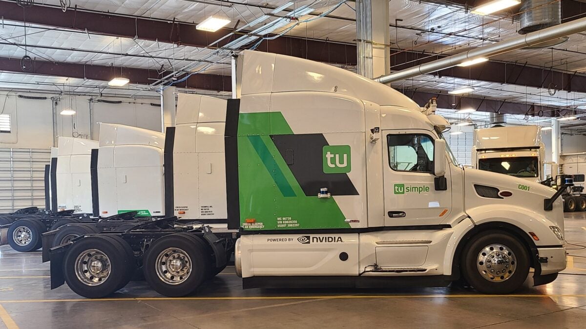 Parked Navistar LTs with TuSimple autonomous technology in TuSimple's base in Tucson, Arizona.