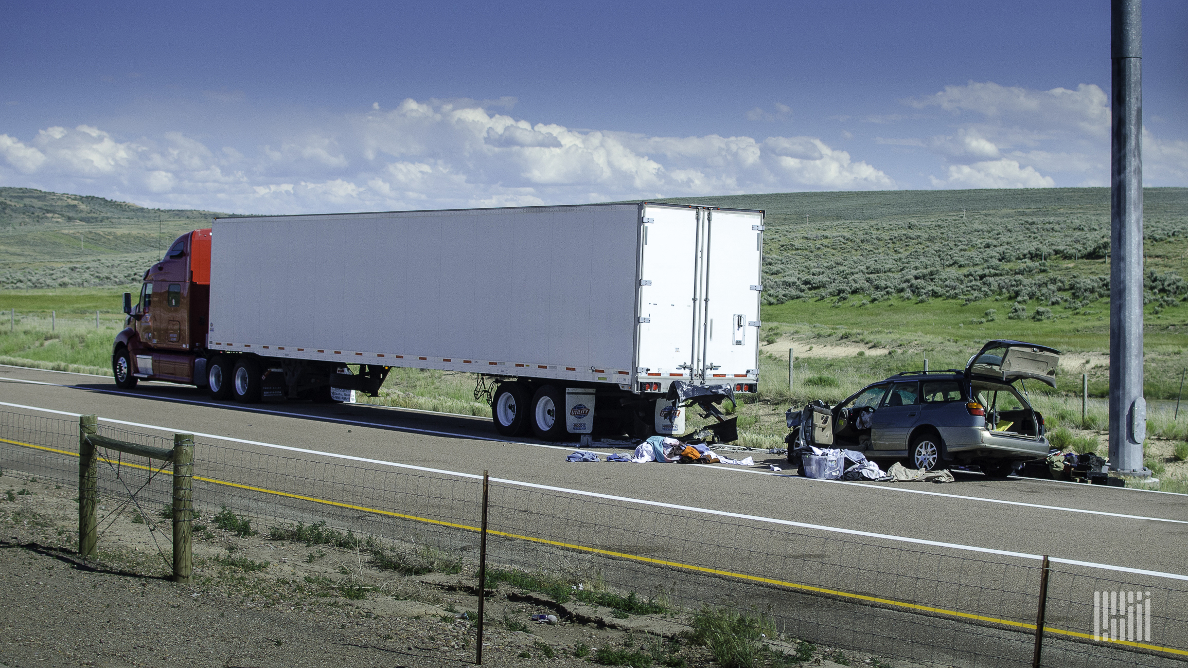 Truck and car involved in rear-end crash.