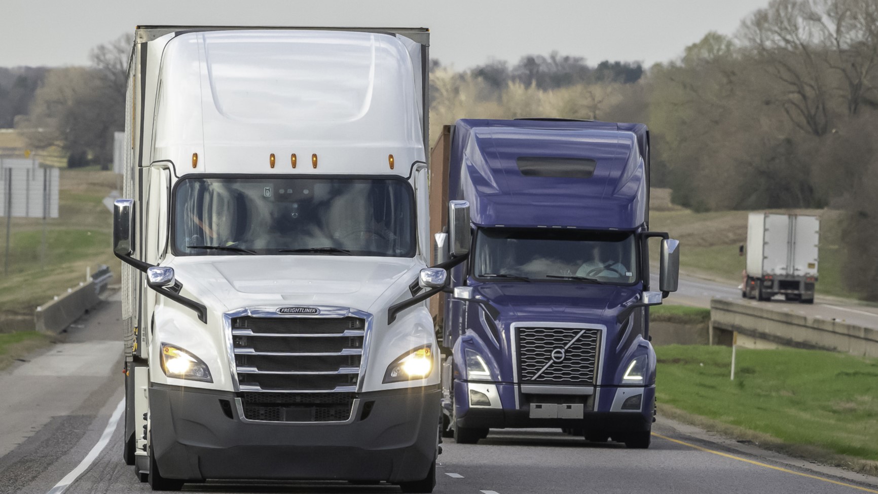 Front view of trucks on the highway