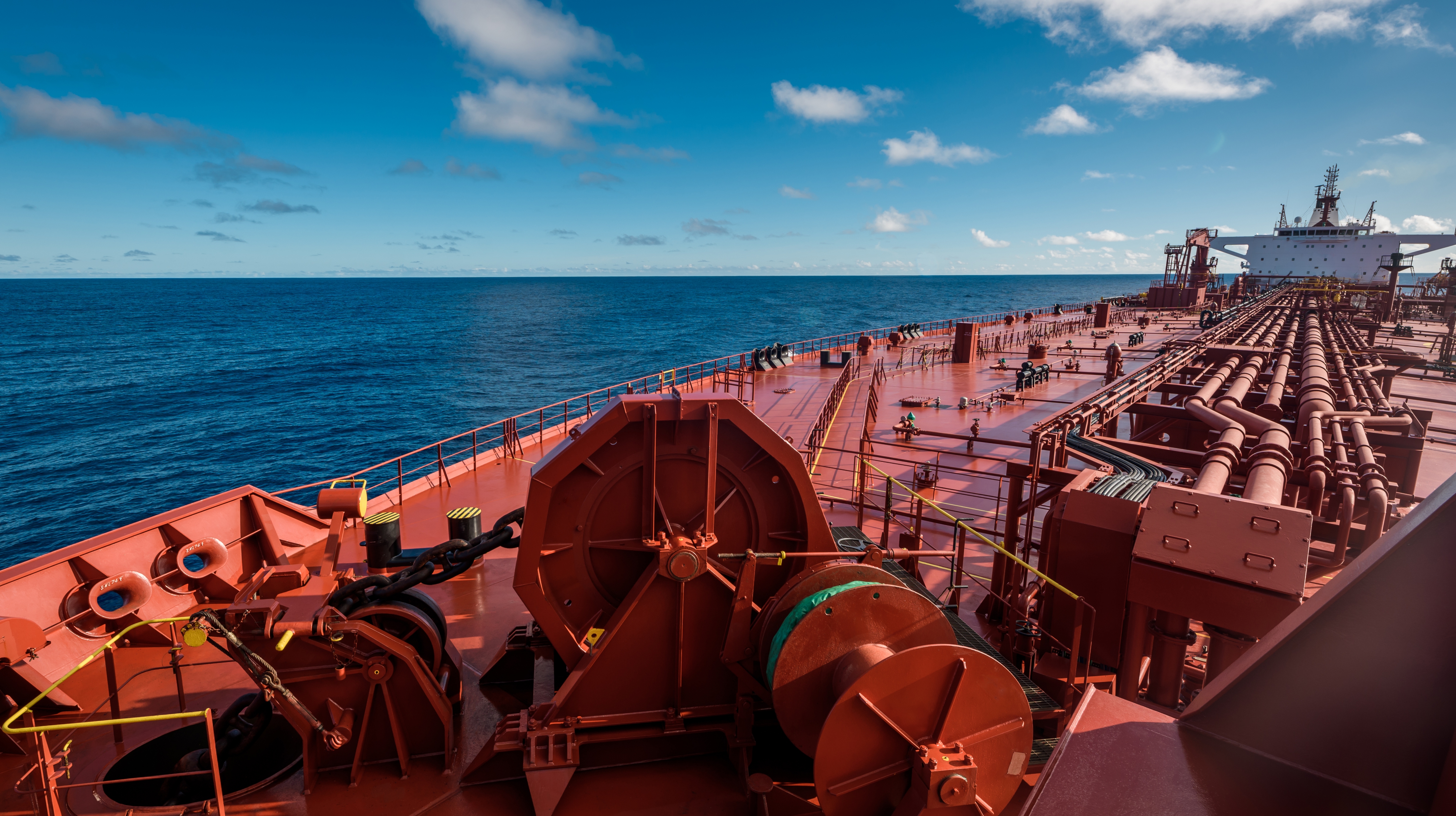 photo of large crude tanker; large ships are earning less than small ships