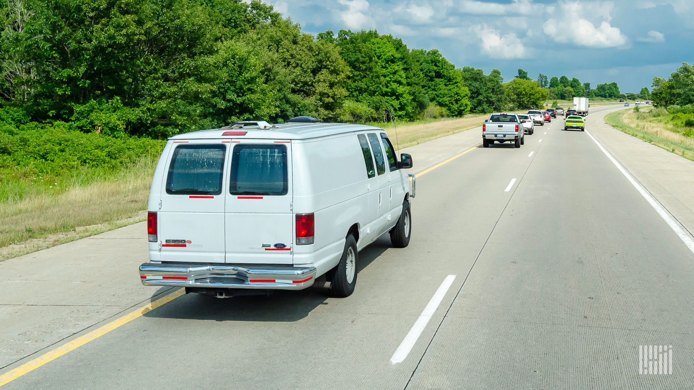 White delivery van on highway