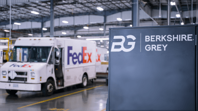 FedEx delivery van next to Berkshire Grey robotics sortation center