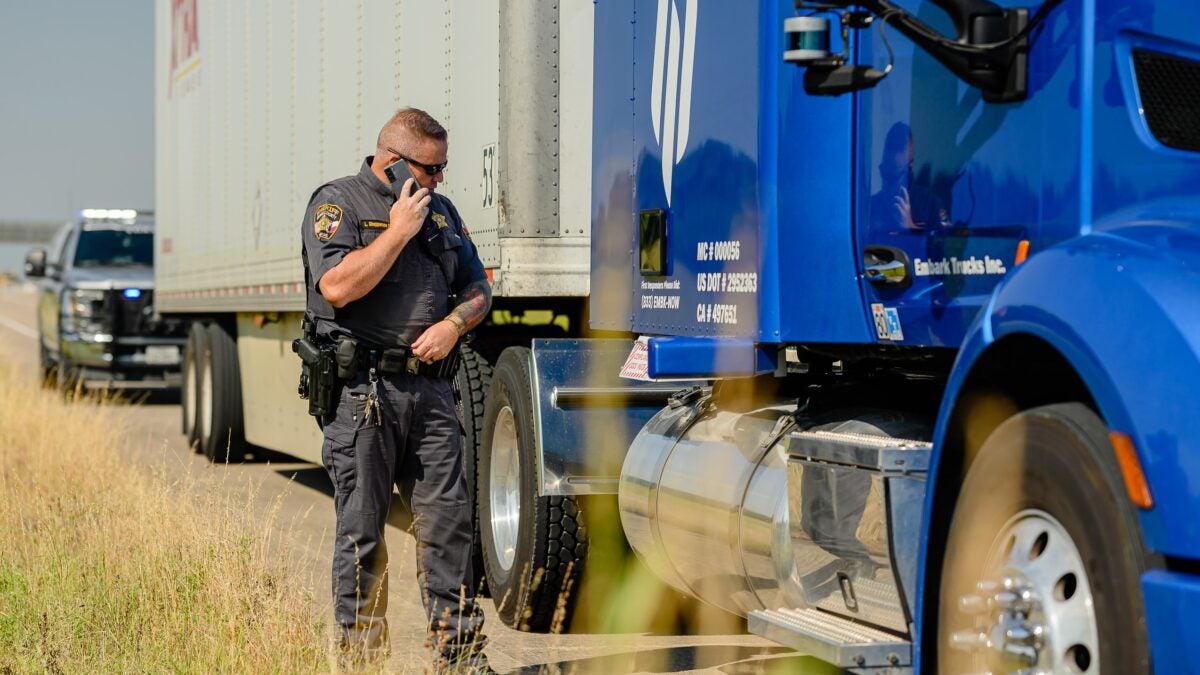 A Texas law enforcement officer makes a call about an autonomous truck stopped during testing.