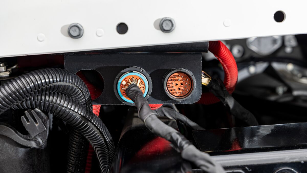 Wires and hoses in the electrical hookup of the Freightliner Plus medium duty trucks.