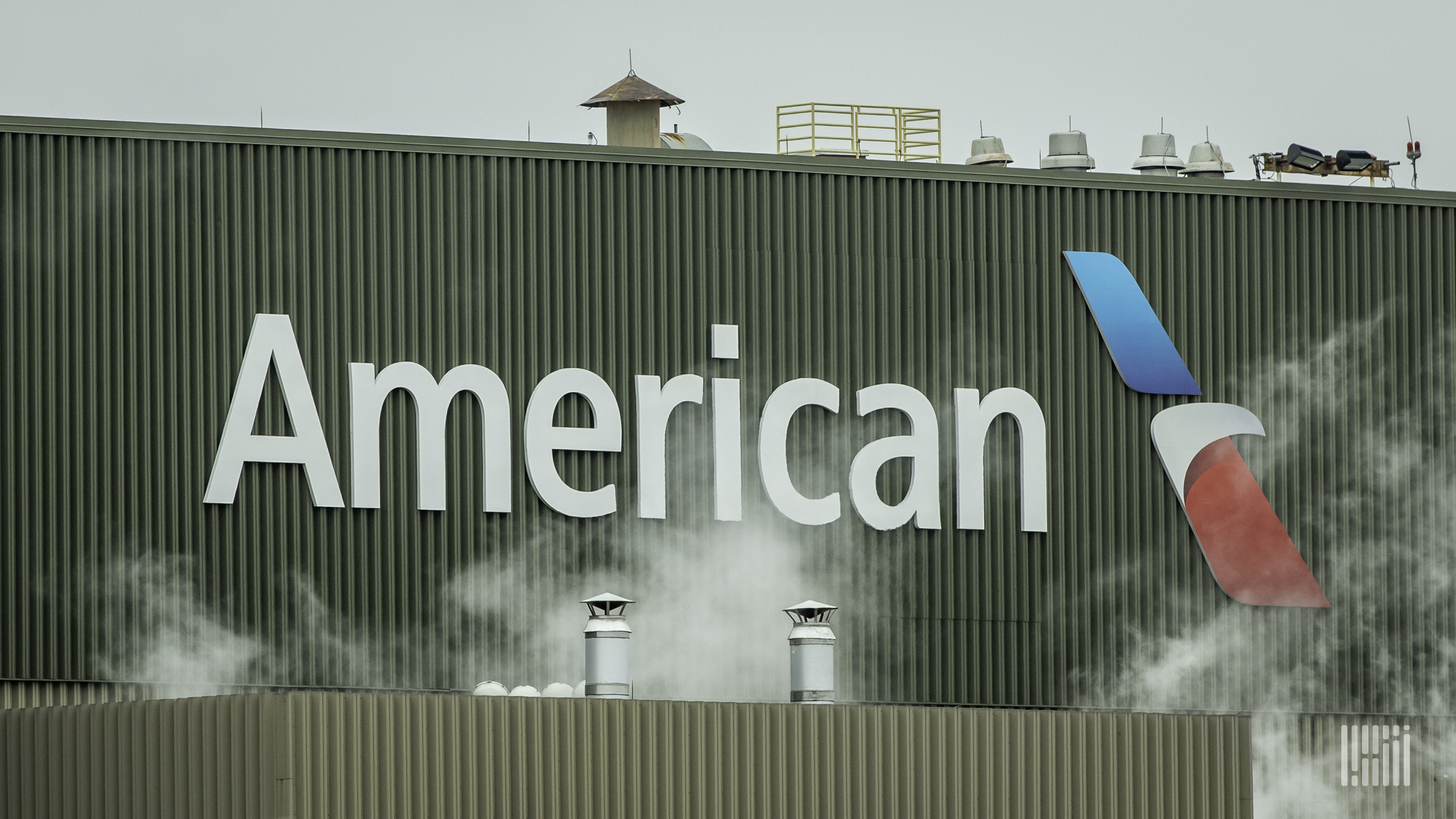 Brand signage of American Airlines on a cargo warehouse.