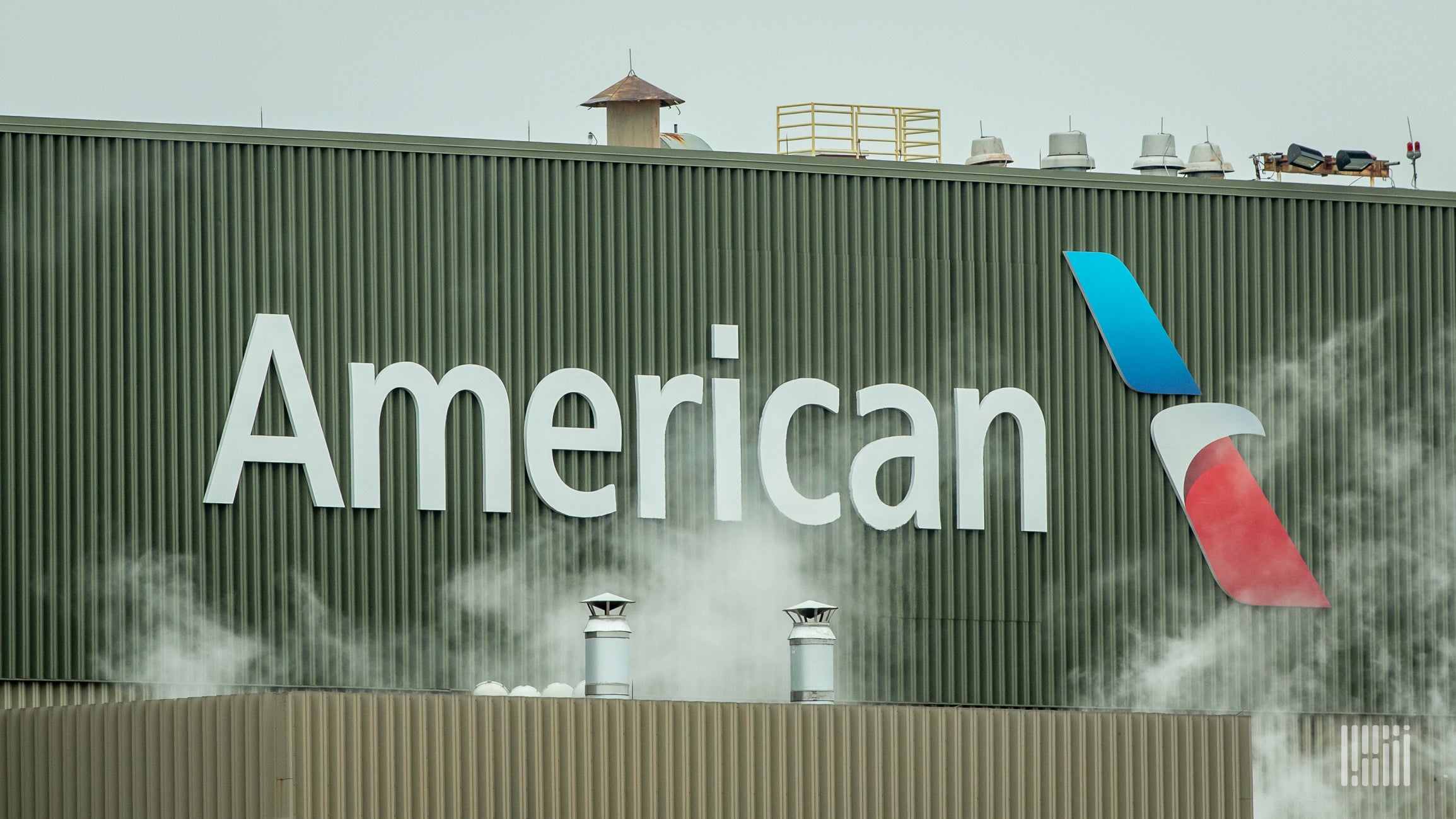 Brand signage of American Airlines on a cargo warehouse.