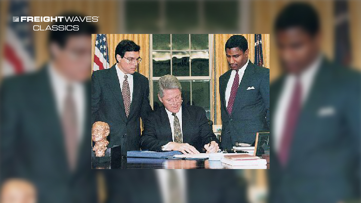 President Clinton signed the National Highway System Designation Act of 1995. With the president are Secretary of Transportation Federico Peña (left) and Federal Highway Administrator Rodney E. Slater. (Photo: The White House)