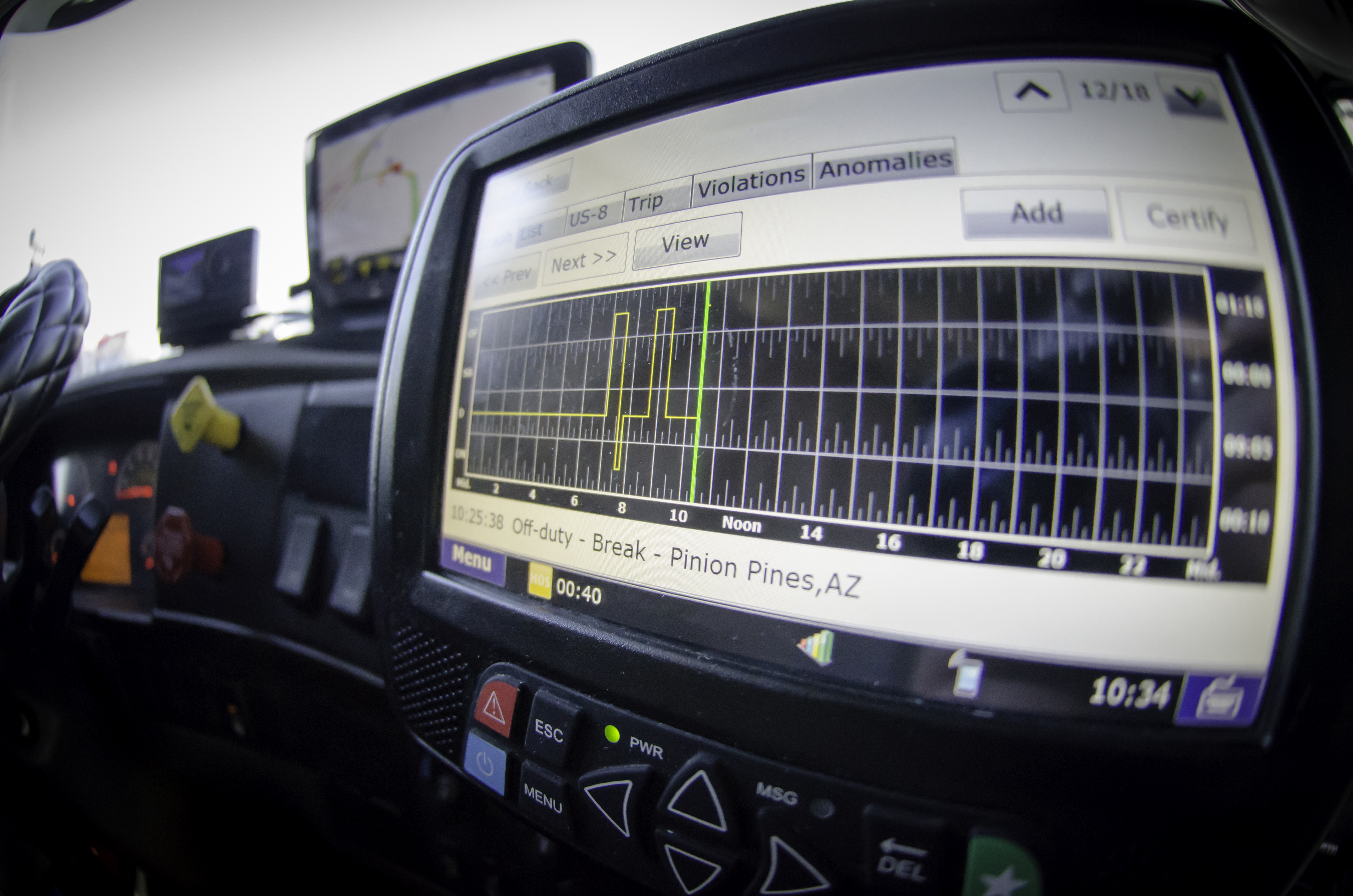 Truck cab electronic logging device.