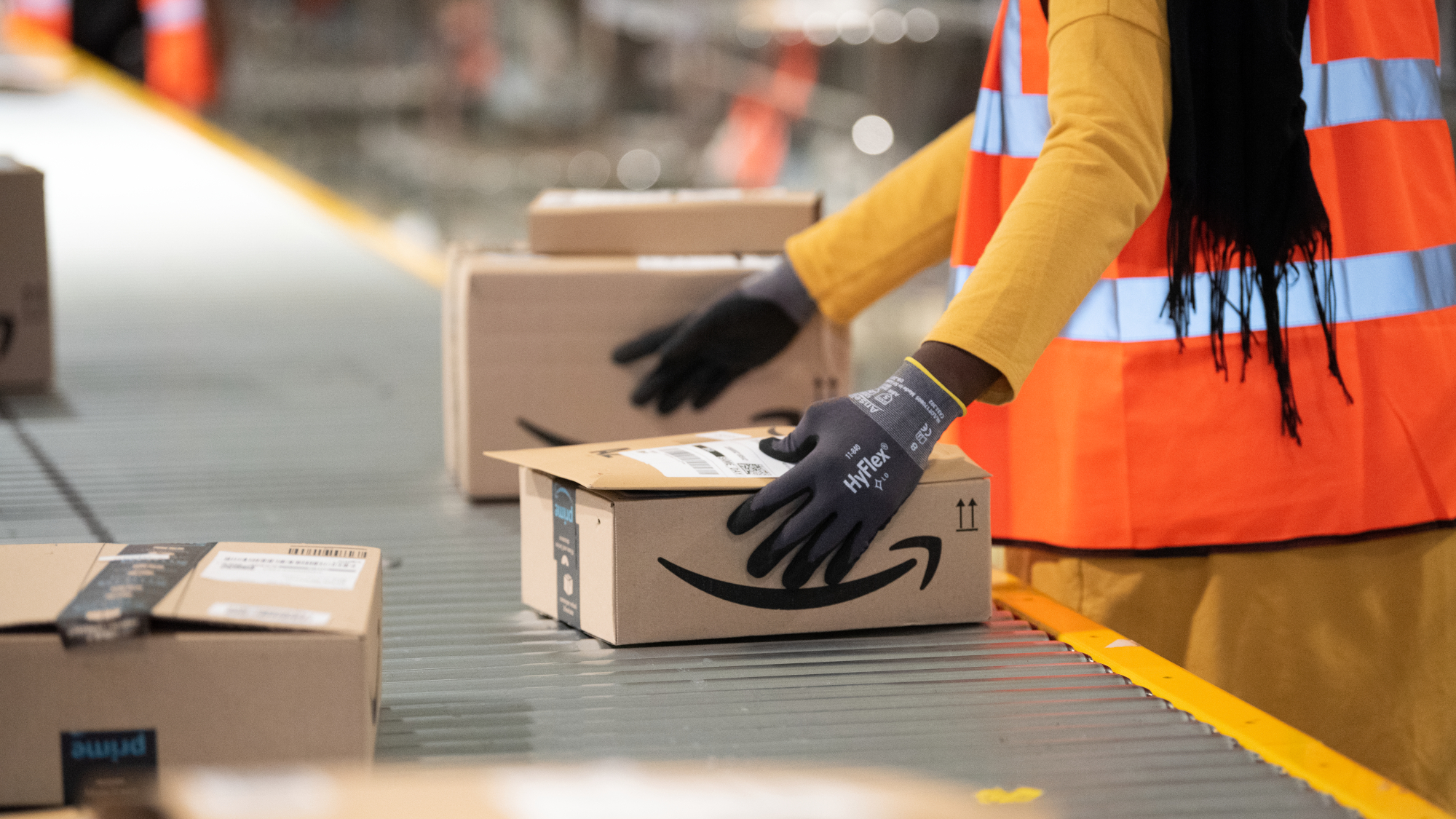 Amazon boxes move on conveyor