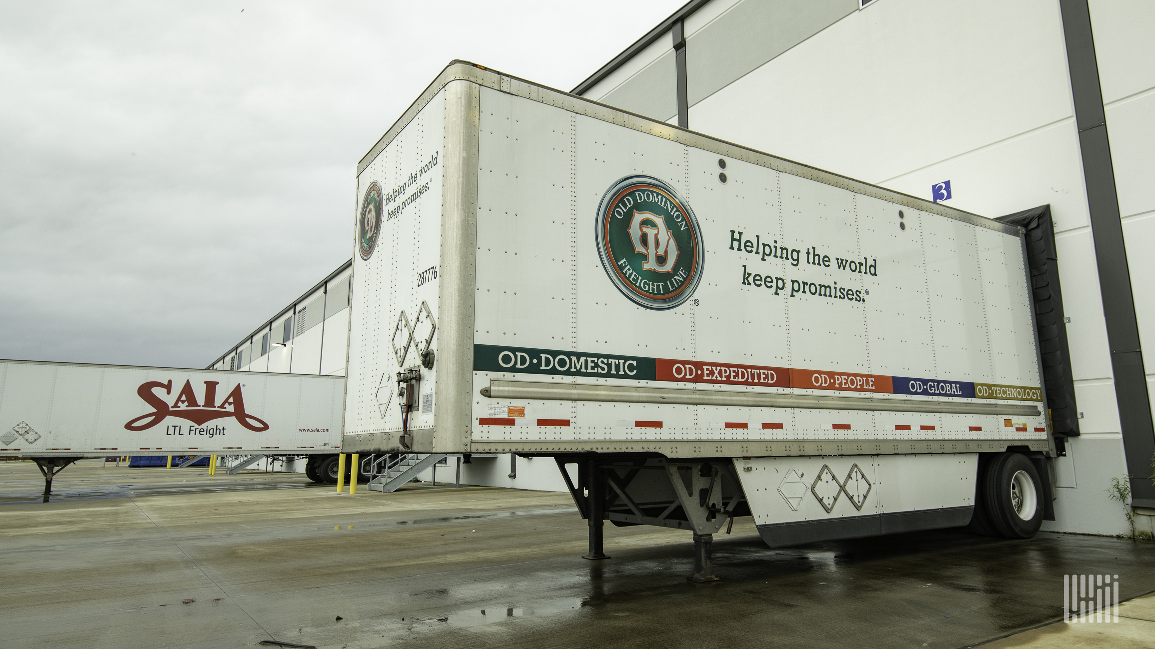 Old Dominion and Saia trailers at a warehouse