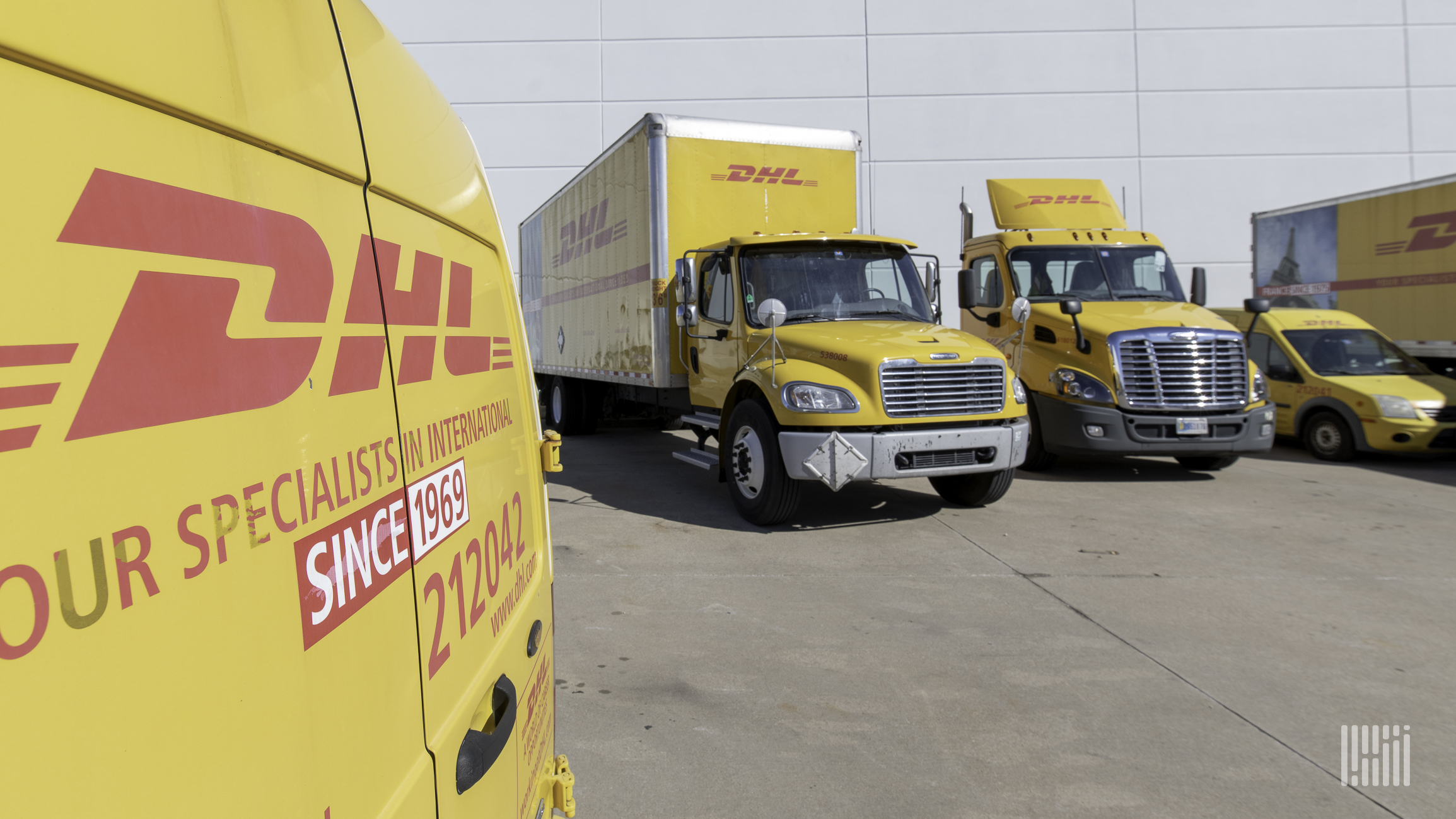 DHL express delivery trucks