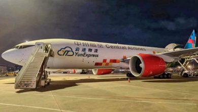 Night view of Central Airlines, YunExpress freighter at an airport.