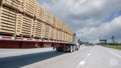 Tractor trailer loaded with pallets