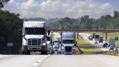 Multiple trucks on the highway