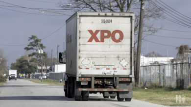 XPO truck with liftgate on road