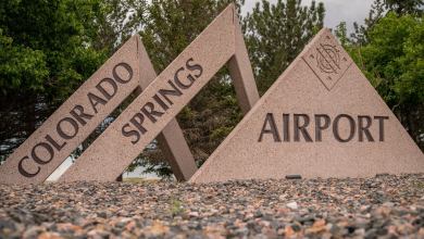 Entrance sign for Colorado Springs Airport.