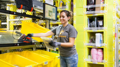 Amazon fulfillment worker fills an e-commerce order