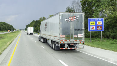 A Heartland Express tractor-trailer on the highway.