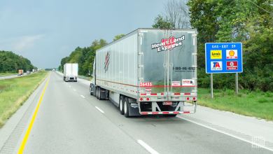 A Heartland Express tractor-trailer on the highway.