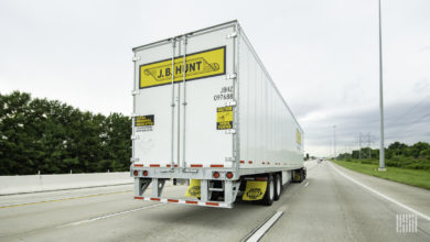 The back of a J.B. Hunt trailer on the highway