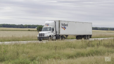 A Holland tractor-trailer on the highway