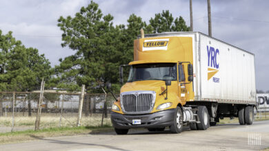 a Yellow tractor-trailer