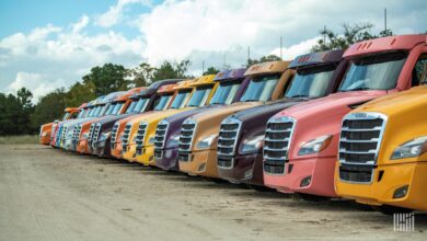 Multi-colored Class 8 trucks in a row