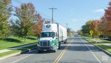 An Old Dominion tractor-trailer on a road
