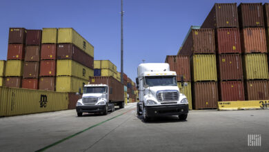 Trucks pulling containers from a port