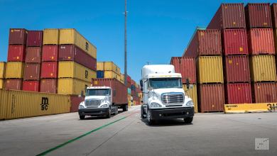 Trucks pulling containers from a port