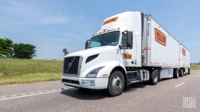 A Yellow Corp. tractor pulling two LTL trailers