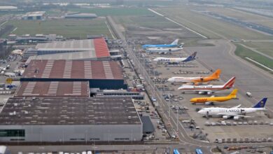 Cargo planes lined up at a terminal at Amsterdam airport.
