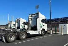Nikola Tre batteryy-electric trucks at Watt EV chargers in Long Beach, California