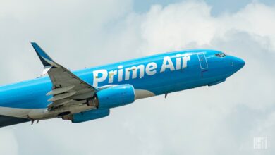 Close up of a light-blue Amazon Prime Air in flight.