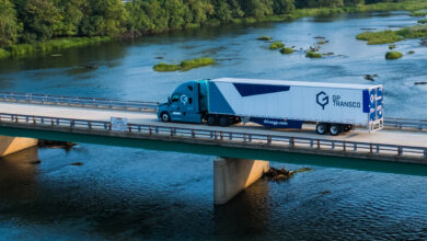 A GP Transco tractor-trailer crossing a bridge
