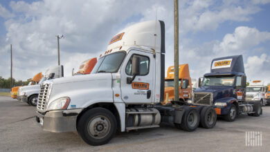 Yellow trucks parked at a shuttered terminal in Houston